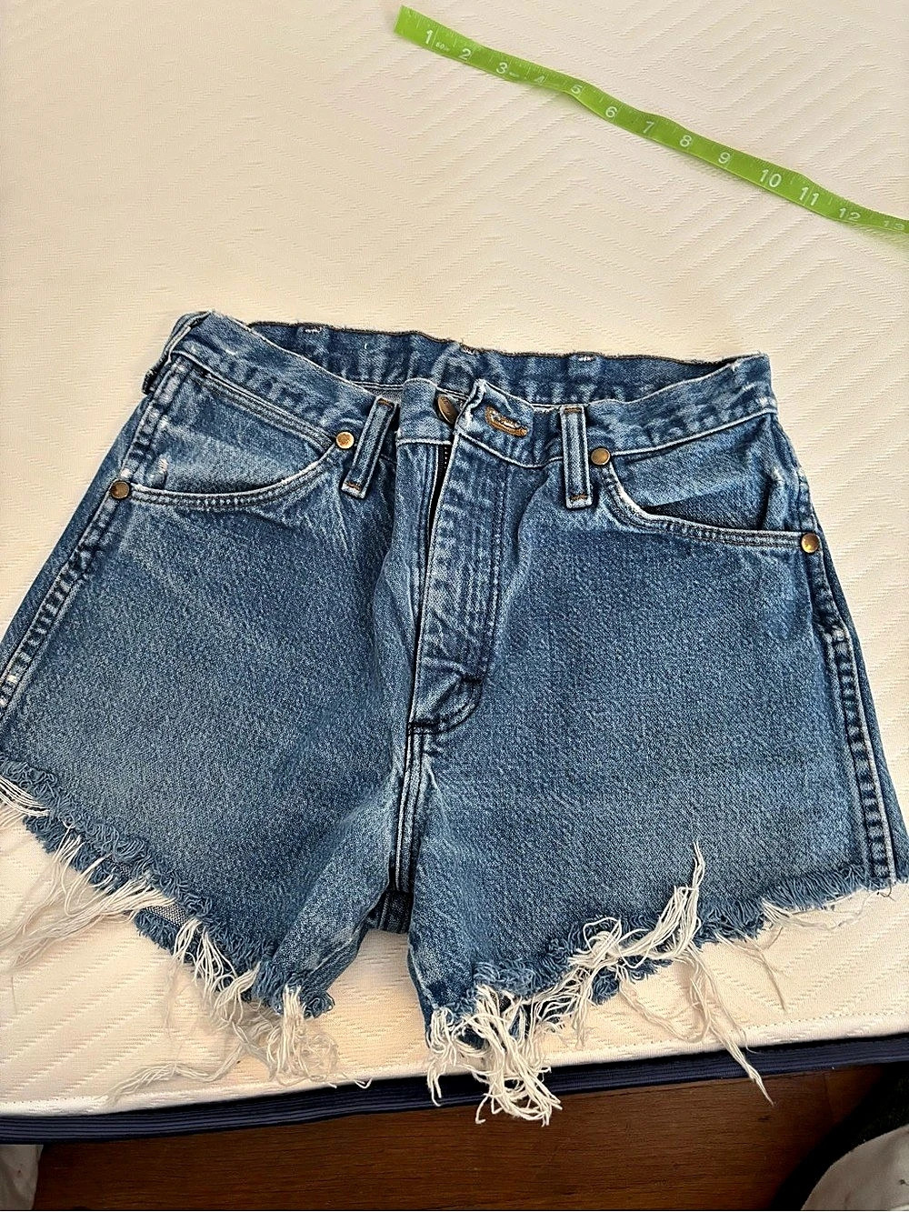Wrangler High-Rise Denim Cutoff Shorts Distressed Denim Jean Shorts in Blue